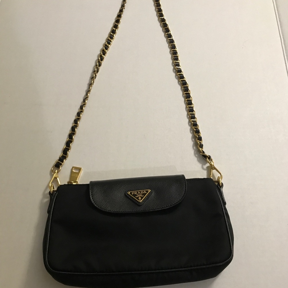 Black Authentic Prada gold chain. Slightly used.